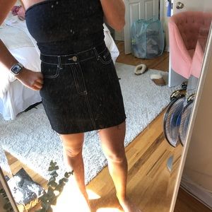 Black denim skirt with white stitching